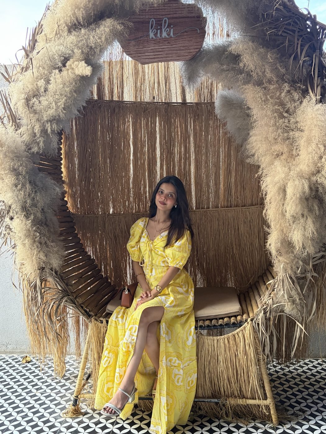 Disha Rokde in a yellow printed dress at a styled set-up